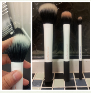 As you can see from the picture on the right the black bristles are shorter and more dense towards the base of the brush, whereas the white bristles are longer and far for sparse.